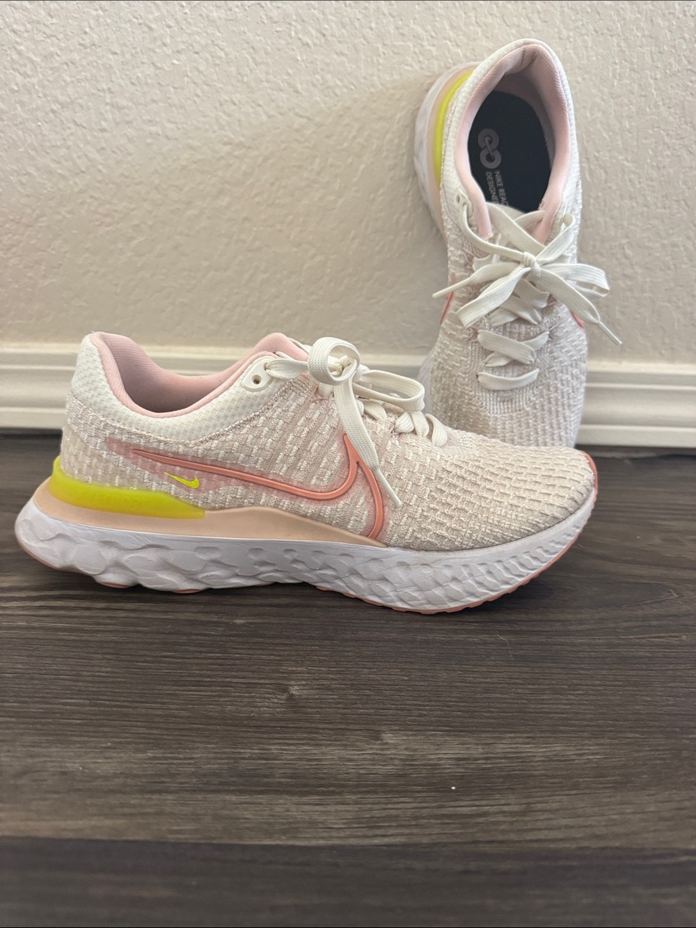 Nike Women's Free React Light Pink and White Running Sneakers